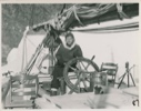 Image of Miriam MacMillan at wheel of the Bowdoin